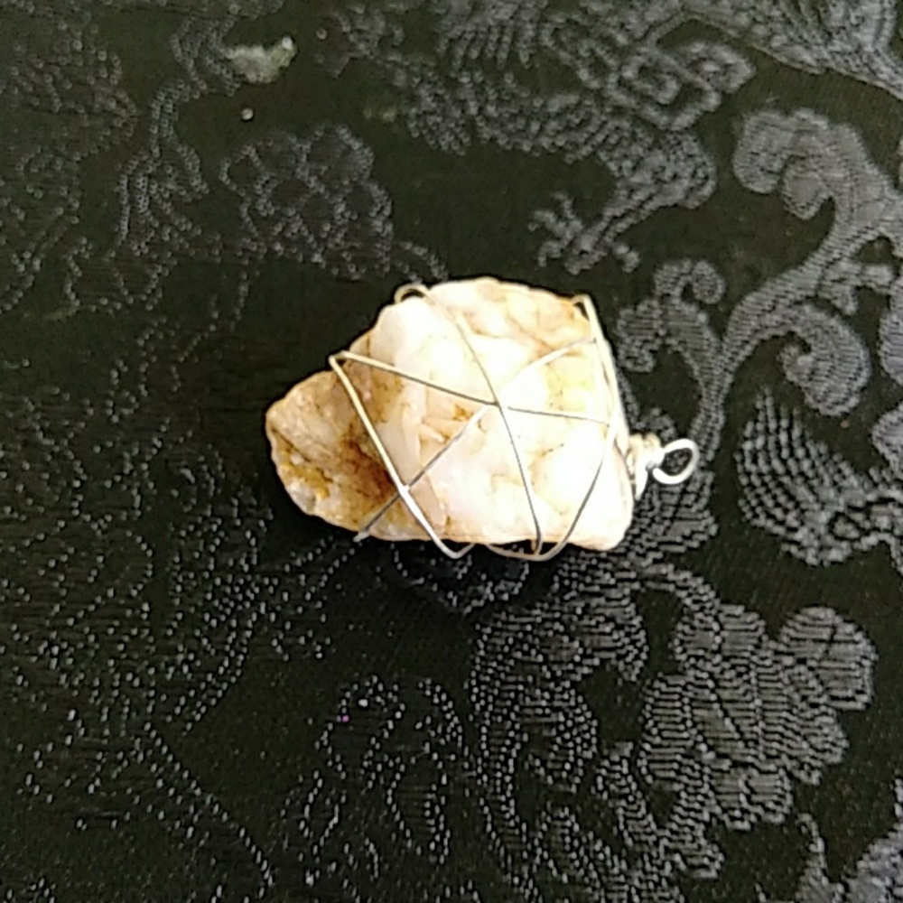 Wow wrapped healing stone pendant